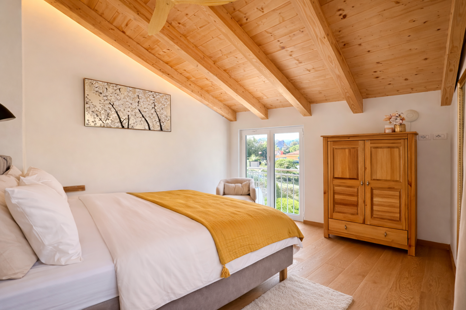 Bedroom with double bed and wooden ceiling.